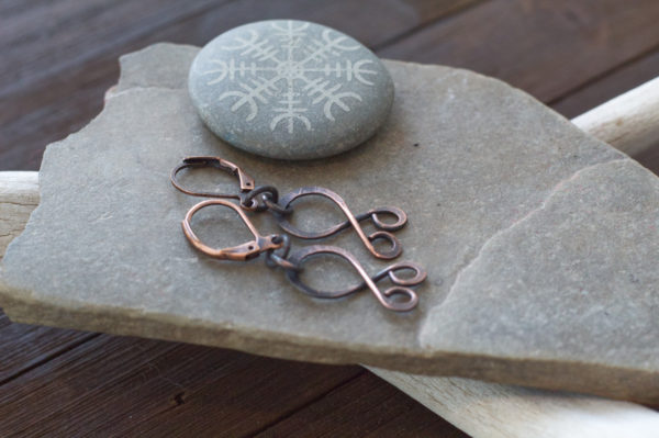 tiny troll cross earrings